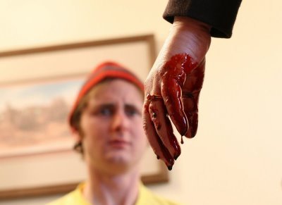 Scene from the dark comedy We Miss You, Pete - isn't that a blood hand?!